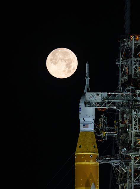 NASA image: Full Moon Rising Over Full Artemis II Stack at Launch Pad 39B